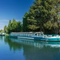 activites beziers canal du midi Canal du Midi ร Bรฉziers avec pรฉniches sous un ciel bleu